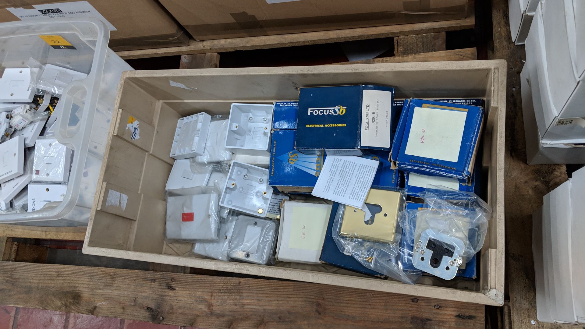 The contents of 4 crates/boxes of assorted fused switches, aerial sockets, plug sockets, pattress - Image 9 of 10