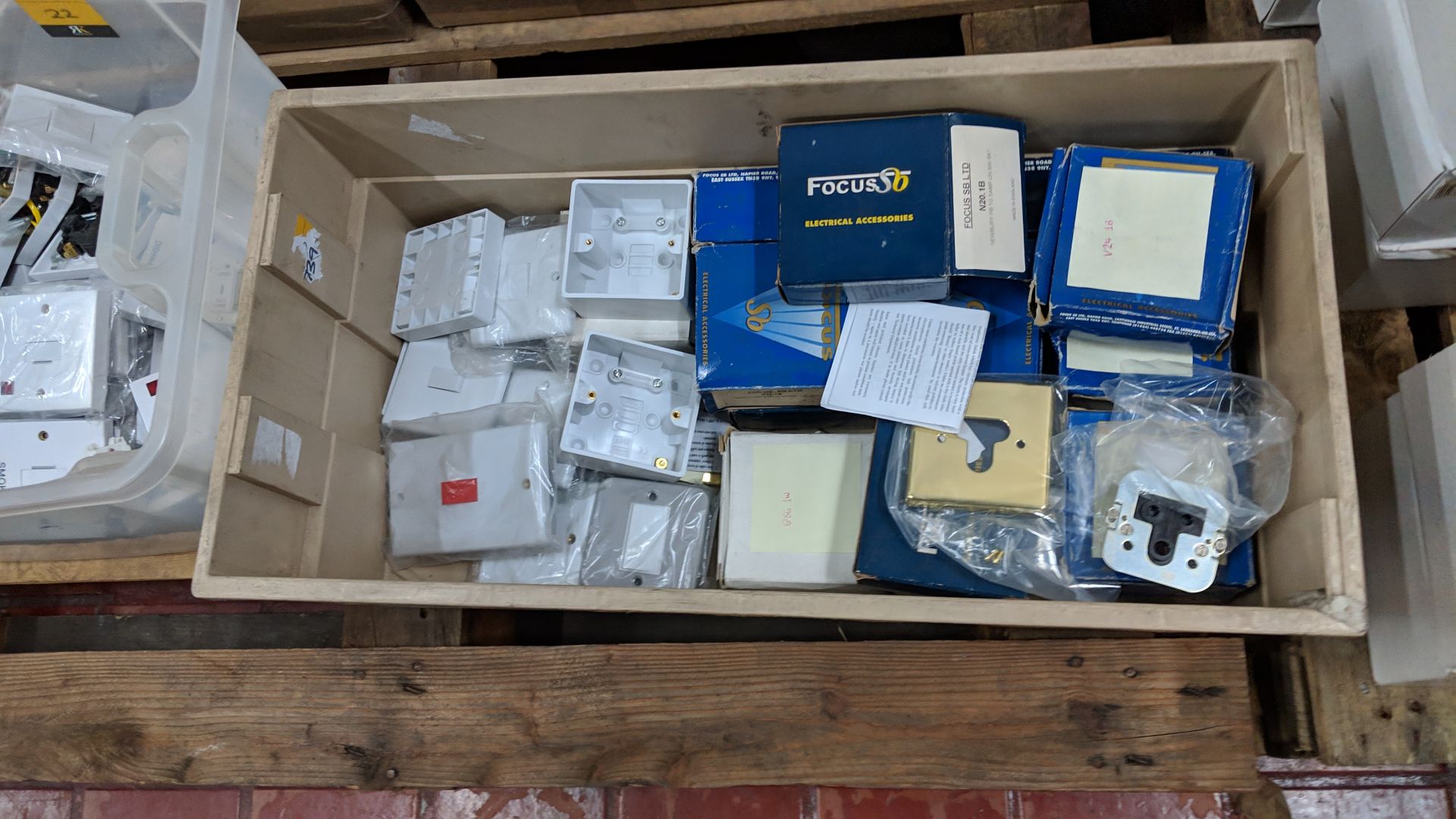 The contents of 4 crates/boxes of assorted fused switches, aerial sockets, plug sockets, pattress - Image 8 of 10