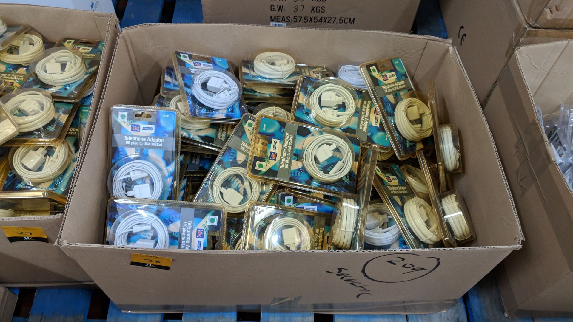 Box of telephone UK to USA adaptor cables This lot is one of a number of lots in this sale being