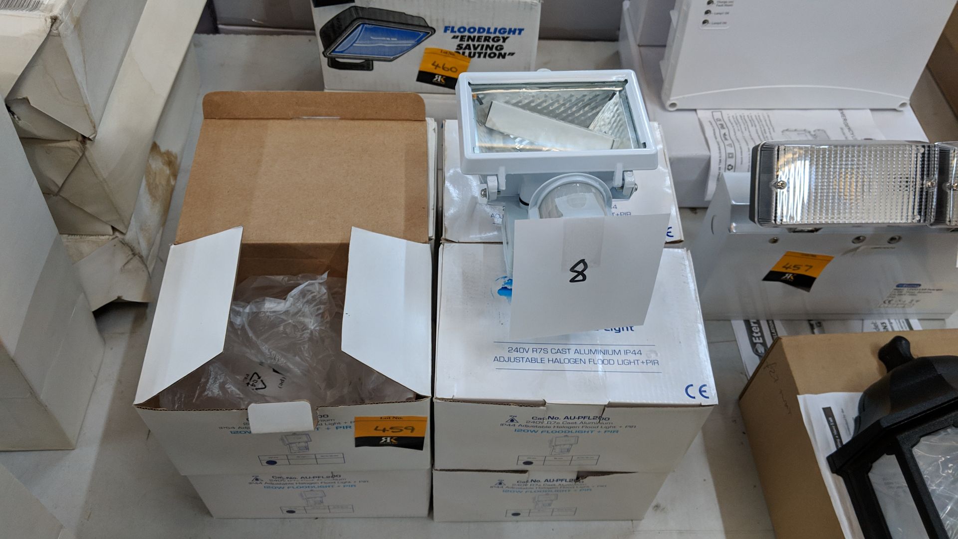 8 off 120W IP44 adjustable halogen floodlight & PIR units This lot is one of a number of lots in