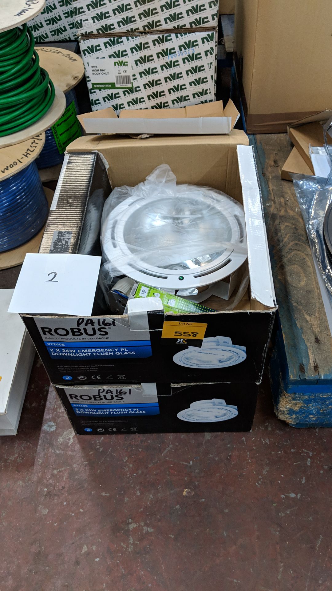 2 off Robus 2 x 26W emergency PL round downlight units with flush glass This lot is one of a