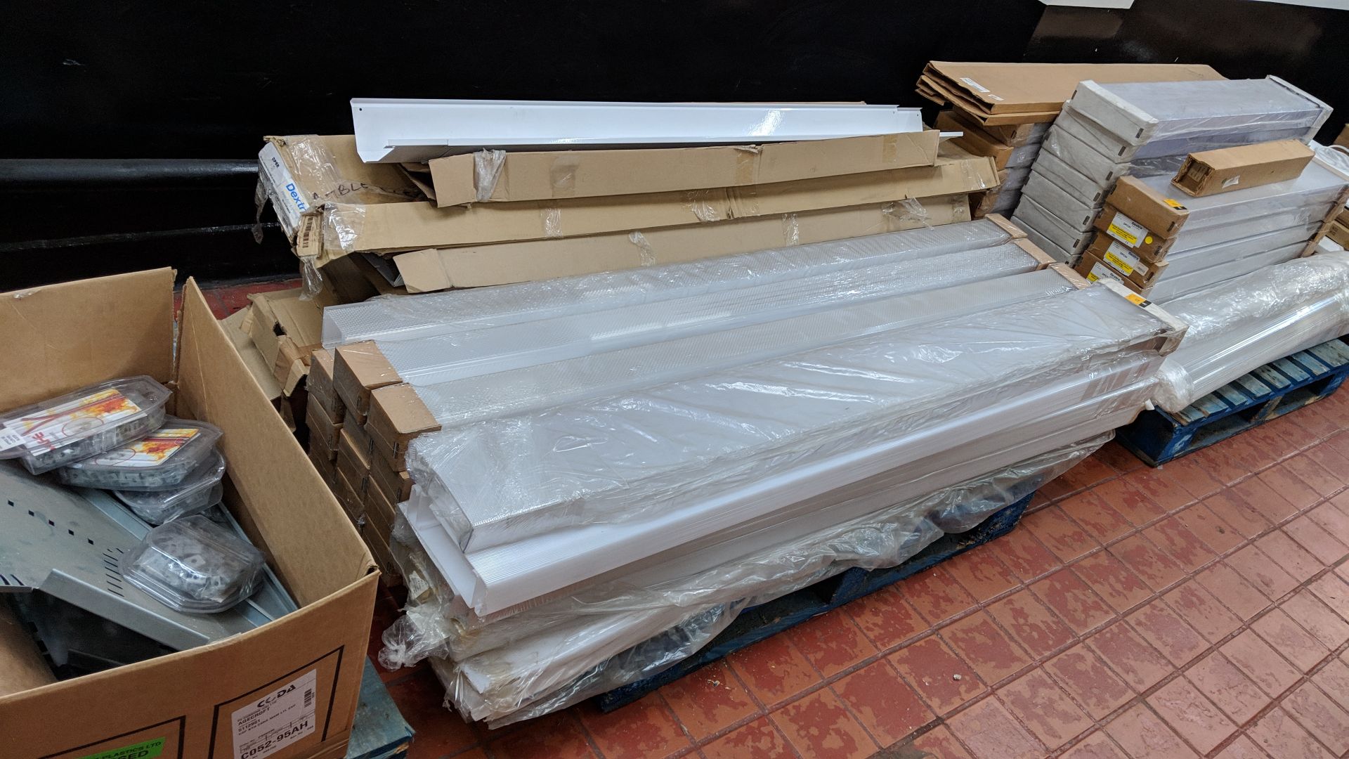 The contents of a pallet of fluorescent fitting diffusers & similar This lot is one of a number of