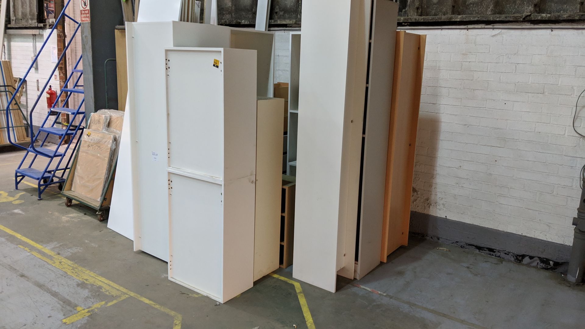Large quantity of furniture including kitchen cupboards & doors, plinths, cupboard carcases &