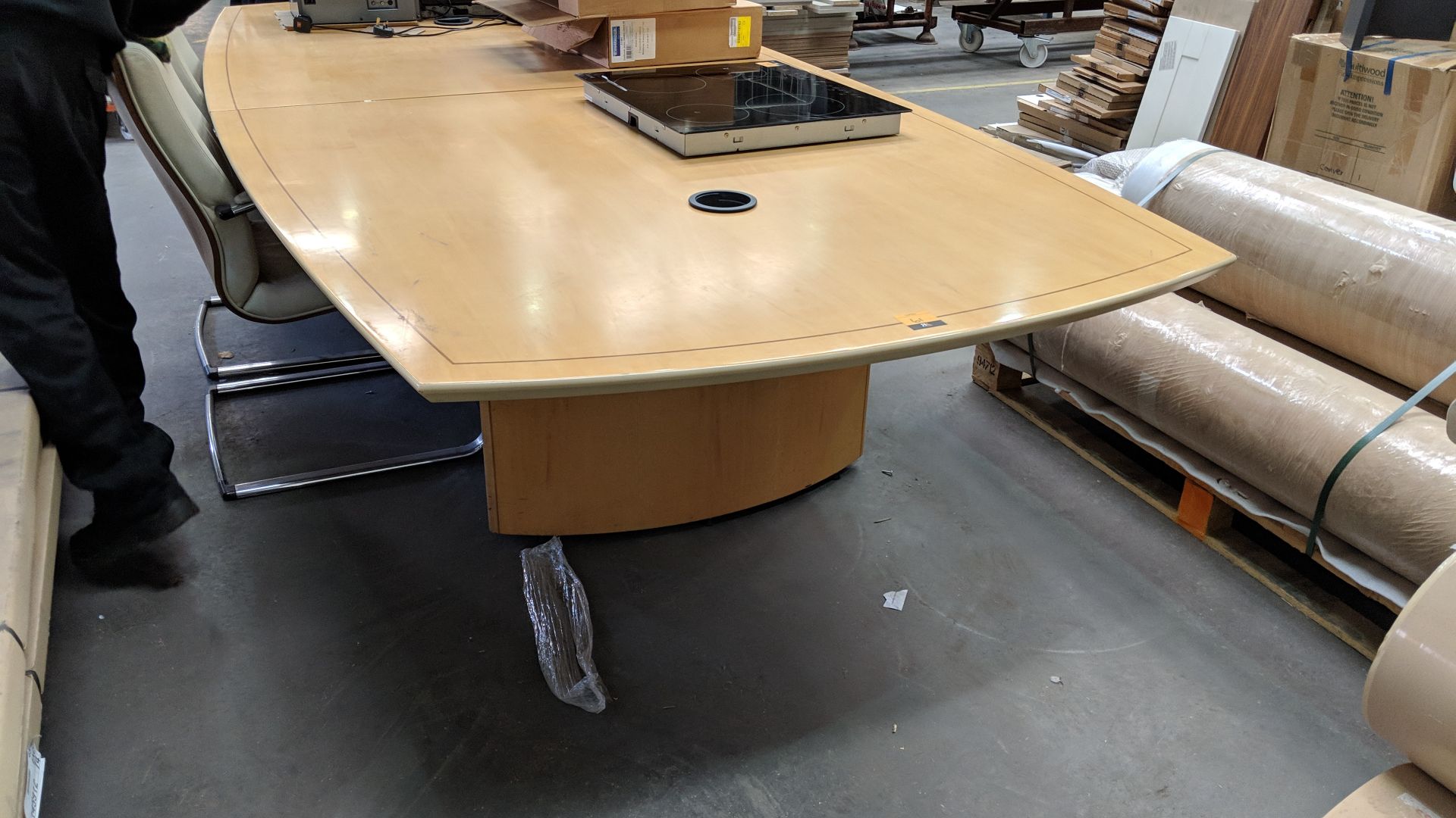 Barrel shaped boardroom table in pale wood with darker wood inlay & modern pedestal, 3200mm x