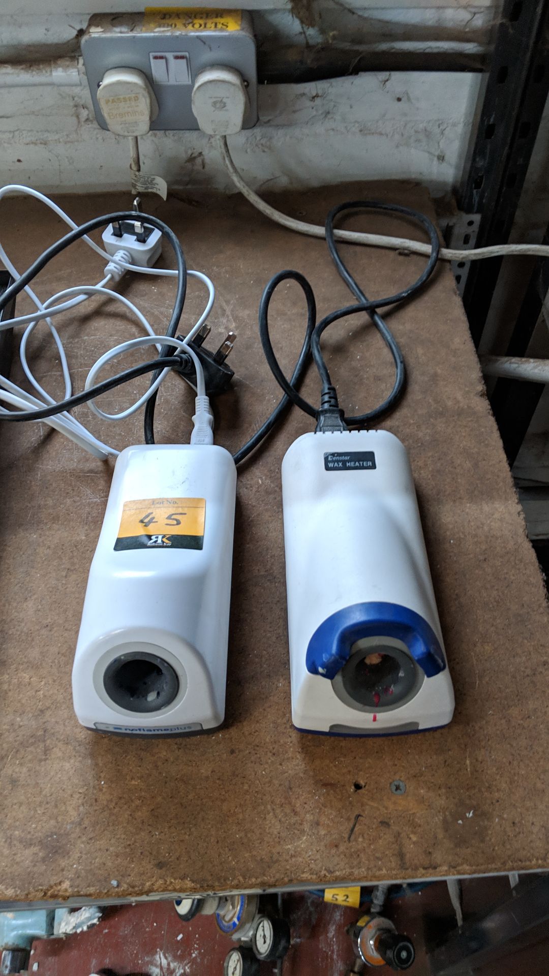 Pair of wax heaters IMPORTANT: Please remember goods successfully bid upon must be paid for and