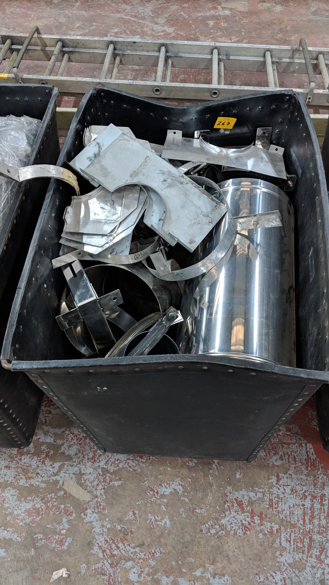 Contents of a wheelie bin of primarily metal flue/chimney components - bin excluded IMPORTANT: