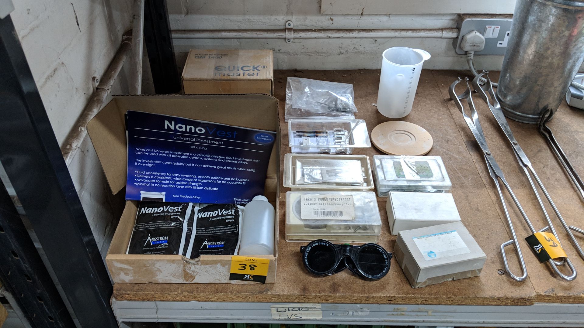 Quantity of assorted dental laboratory supplies including lotions, tooling, goggles & more