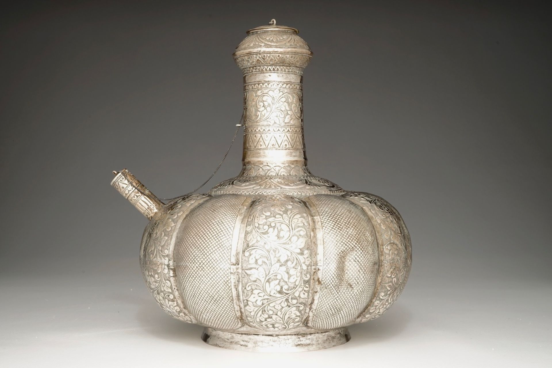 A silvered brass kendi, Mughal, India, 18/19th C. H.: 27 cm - L.: 24 cm We have more lots - Image 3 of 7