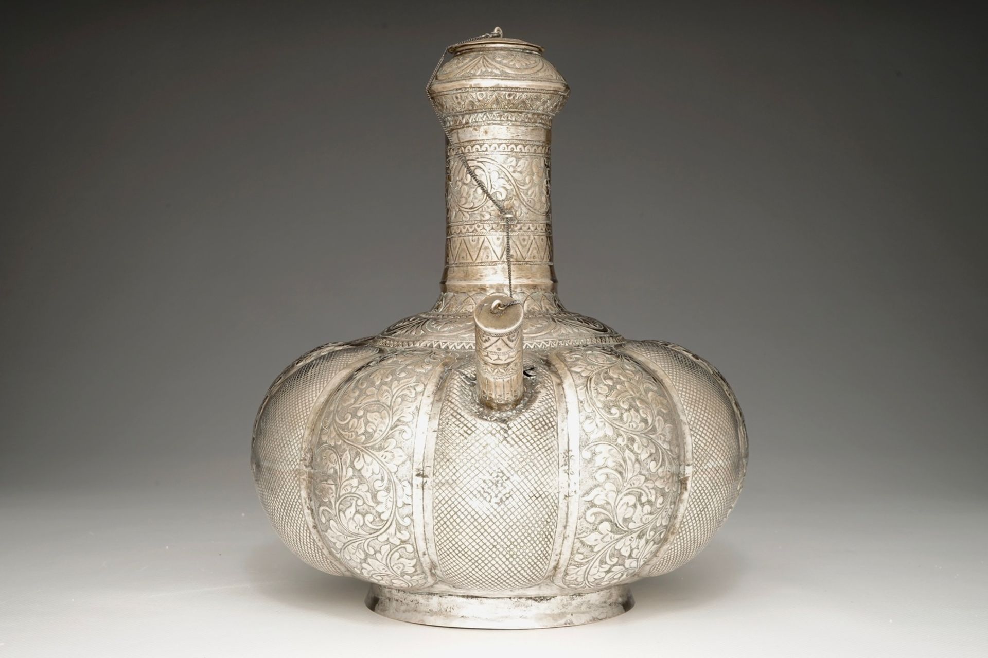 A silvered brass kendi, Mughal, India, 18/19th C. H.: 27 cm - L.: 24 cm We have more lots - Image 2 of 7