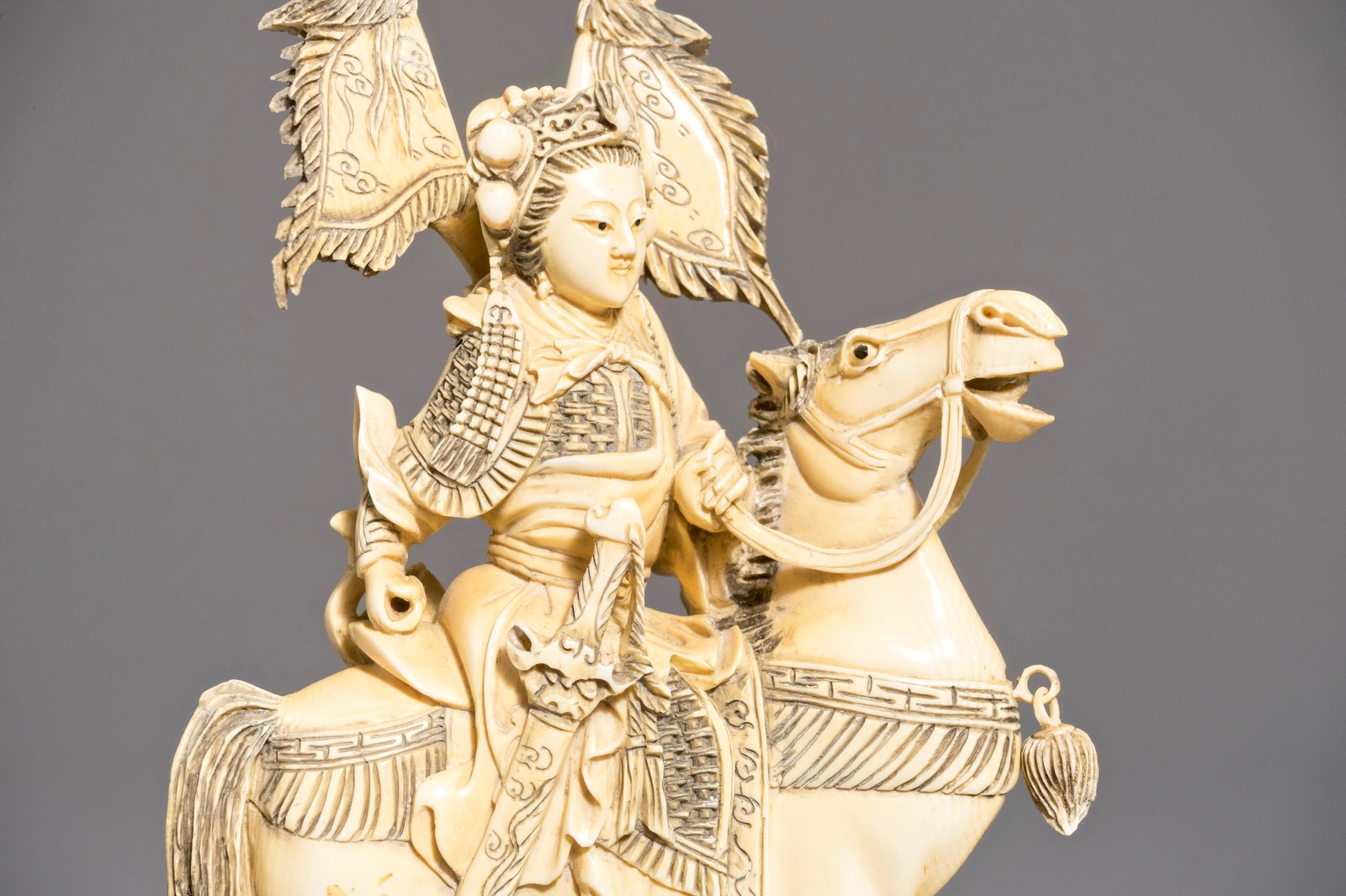 A pair of Chinese carved ivory horseriders, 19th C. - Image 8 of 9