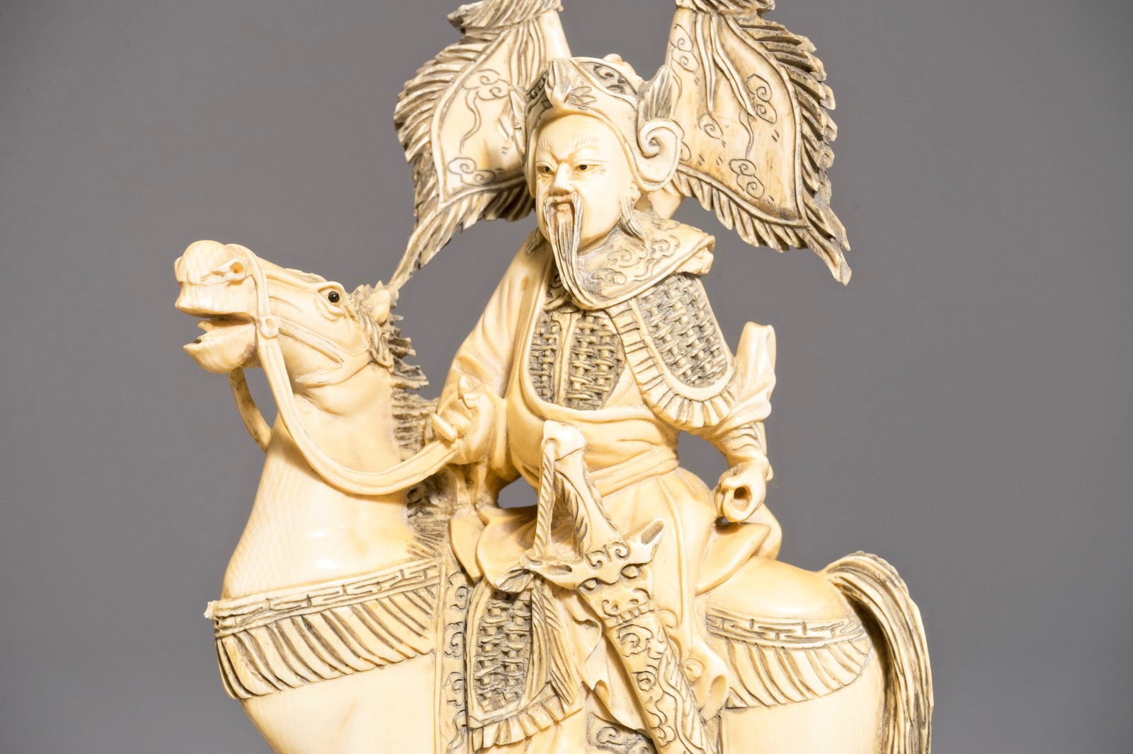 A pair of Chinese carved ivory horseriders, 19th C. - Image 9 of 9