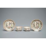 A pair of fine Chinese famille rose cups and saucers with figures in a garden, Yongzheng/Qianlong