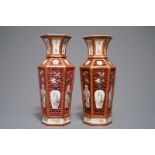 A pair of reticulated double-walled hexagonal Chinese famille rose vases, Yongzheng