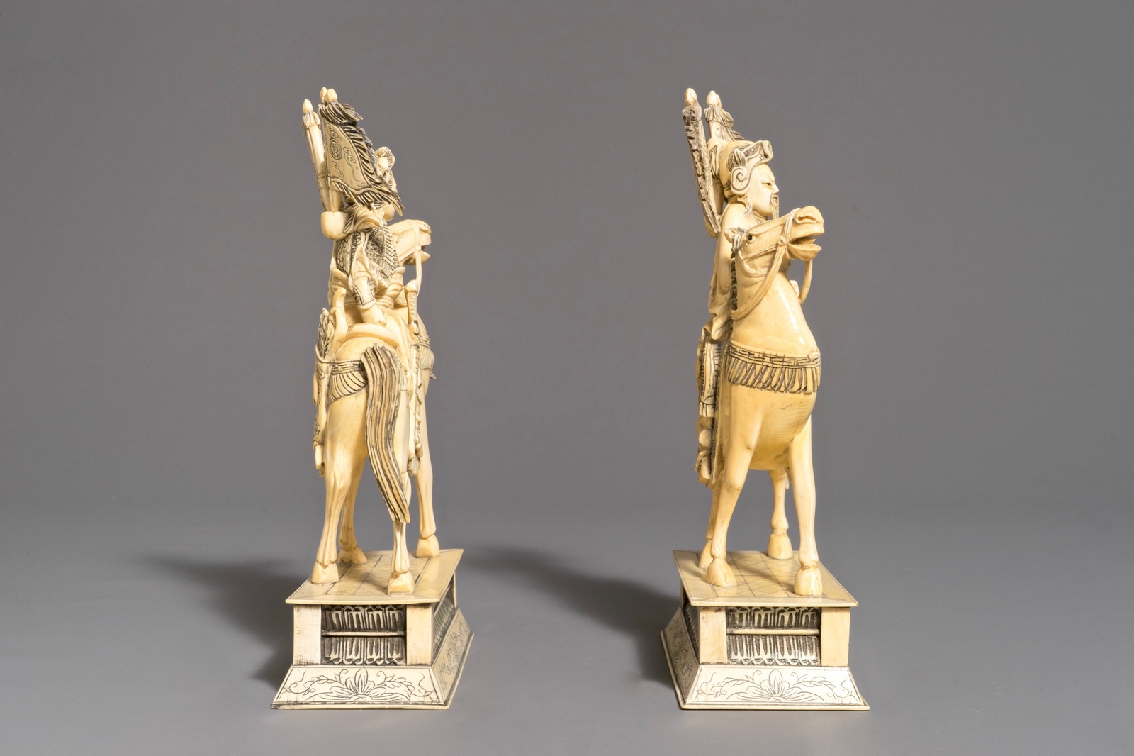 A pair of Chinese carved ivory horseriders, 19th C. - Image 5 of 9