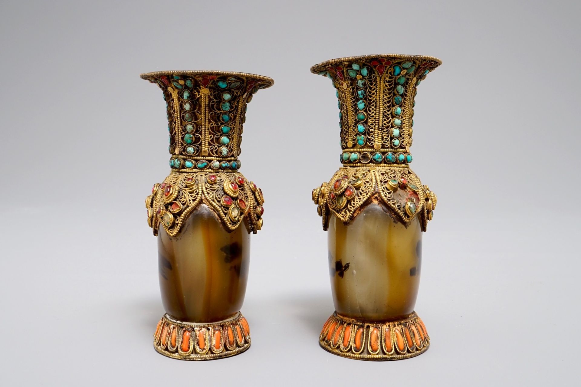 A pair of Tibetan agate flasks with turquoise- and coral-inlaid gilt silver mounts, 19th C. - Image 4 of 6