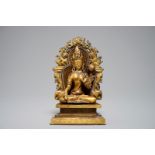 A Sino-Tibetan gilt bronze and copper alloy figure of White Tara, 19/20th C.