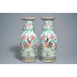 A pair of Chinese famille rose vases with birds among flowers, 19th C.