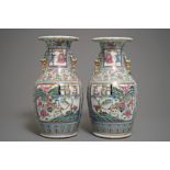 A pair of Chinese famille rose vases with warriors on horseback, 19th C.