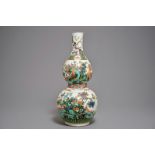 A large Chinese famille verte double gourd vase, inscribed Kangxi, 20th C.