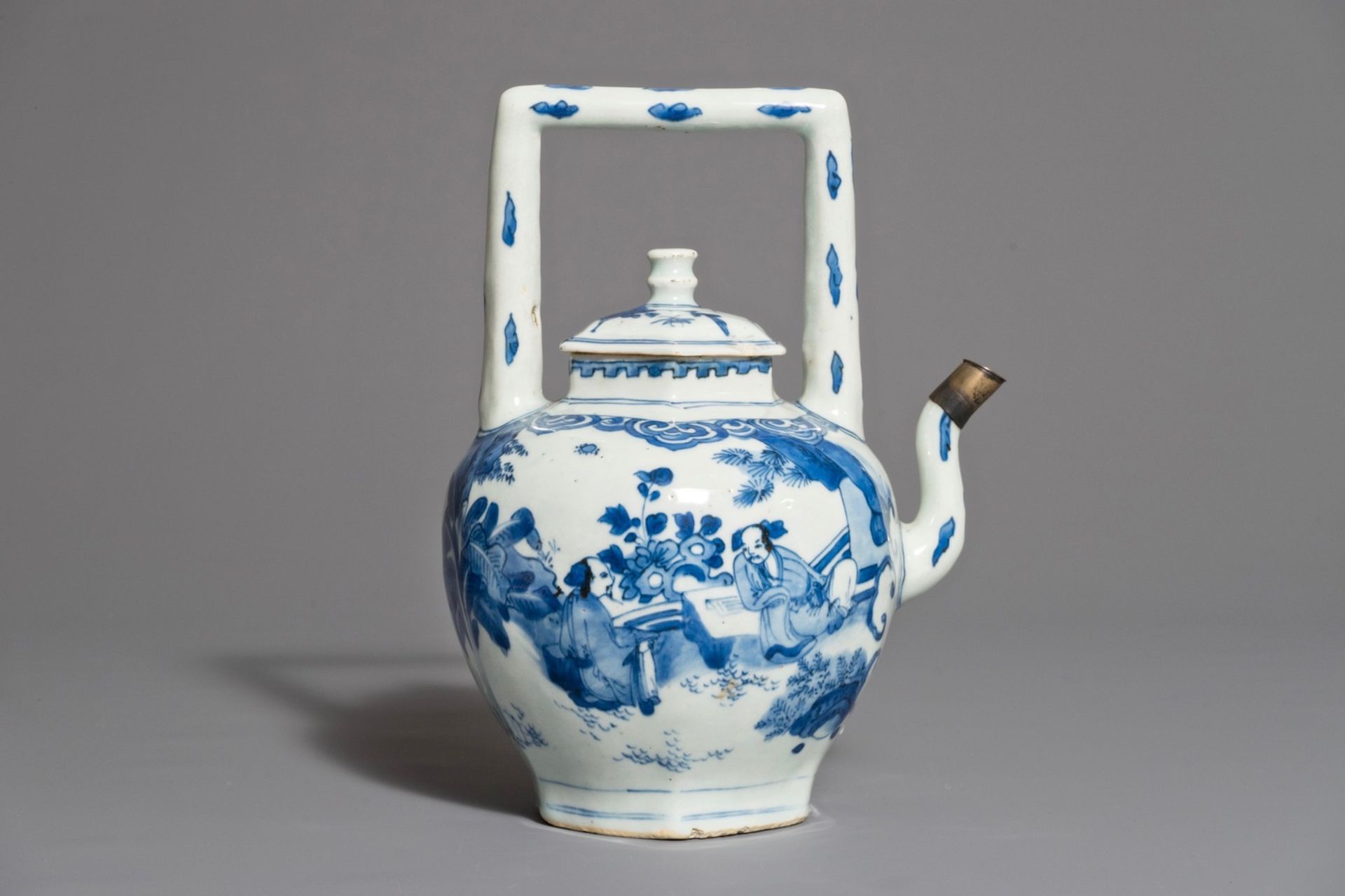 A Chinese blue and white wine jug and cover with silver-mounted spout, Transitional period