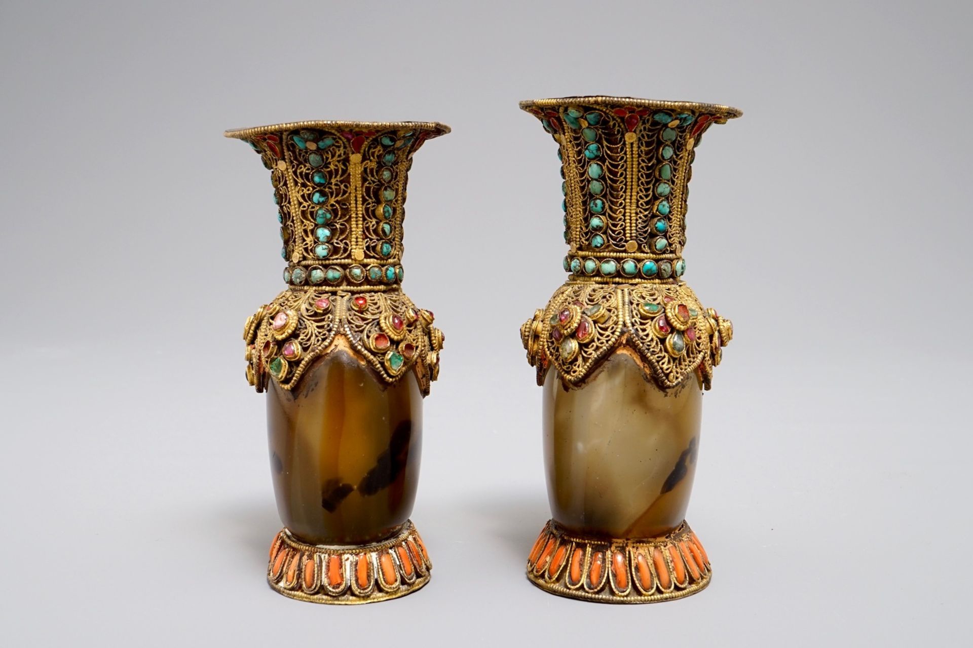 A pair of Tibetan agate flasks with turquoise- and coral-inlaid gilt silver mounts, 19th C. - Image 2 of 6