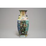 A hexagonal Chinese famille rose vase with applied design, 19th C.