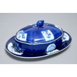 A Chinese powder blue tureen and cover on stand, 19th C.