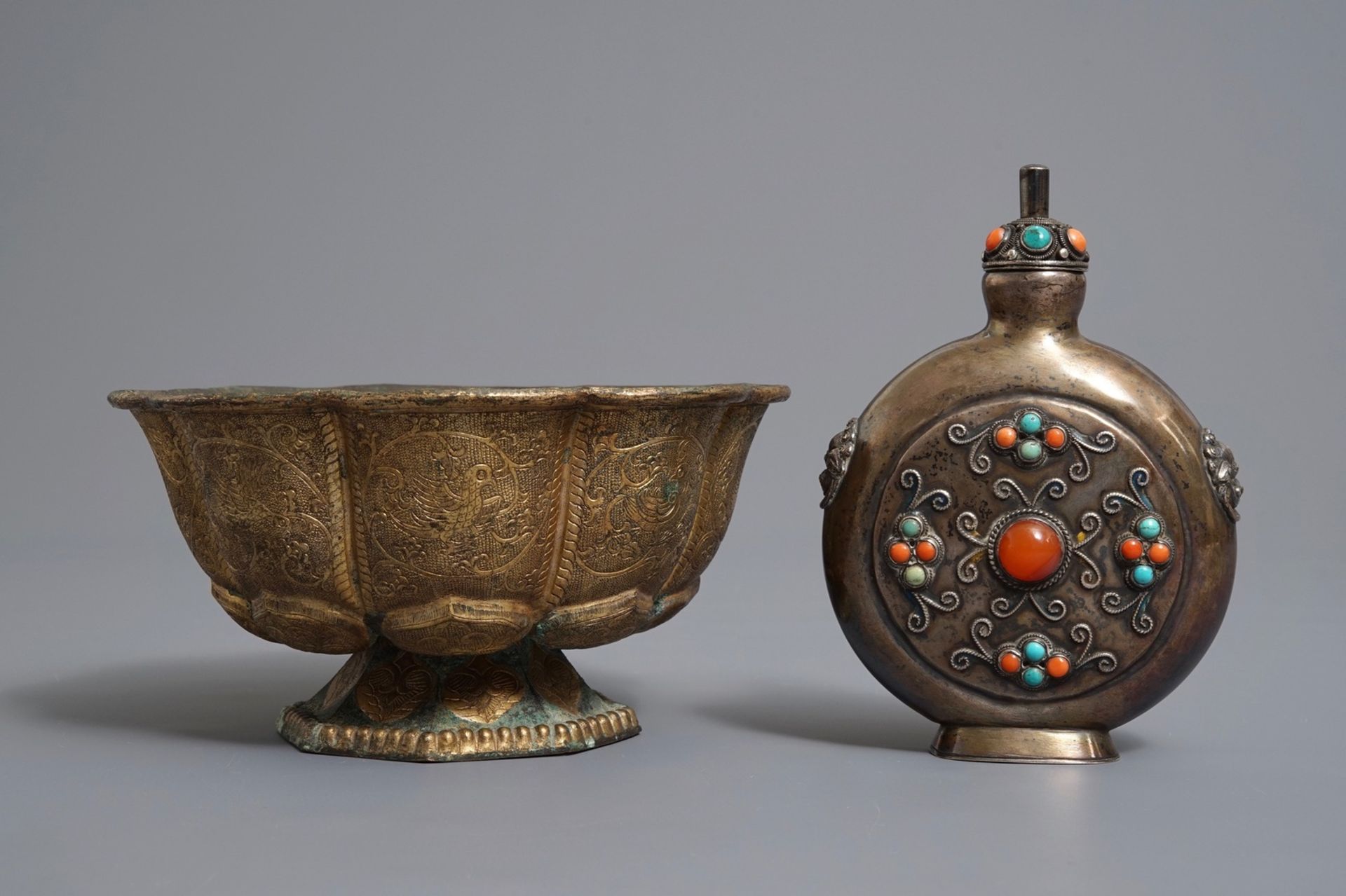 A gilt brass bowl and an inlaid silver flask, Tibet, 19/20th C. - Image 3 of 8