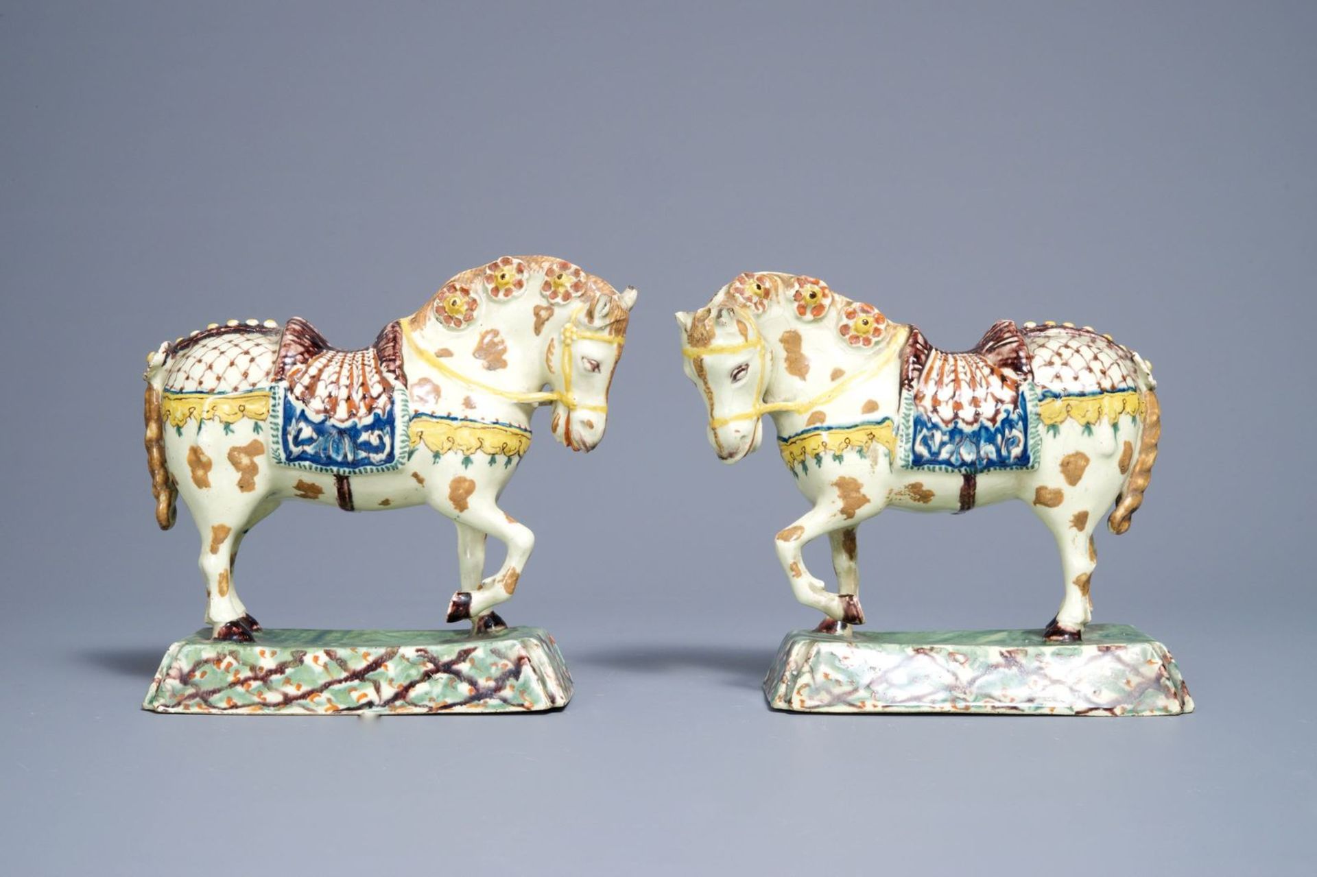 A pair of polychrome Dutch Delft lime-green ground models of circus horses, 19th C. - Image 2 of 7