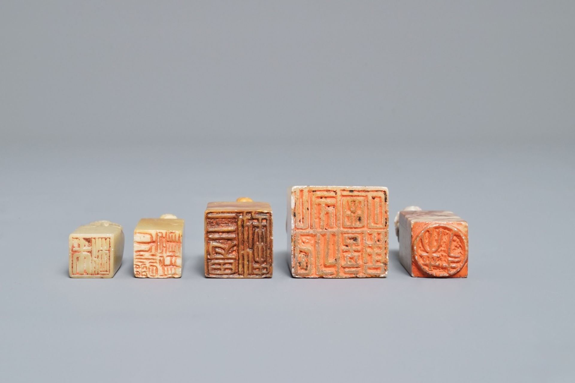 A collection of 23 Chinese jade, soapstone and hardstone seals, carvings, hooks and bangles, 19/ - Image 2 of 2