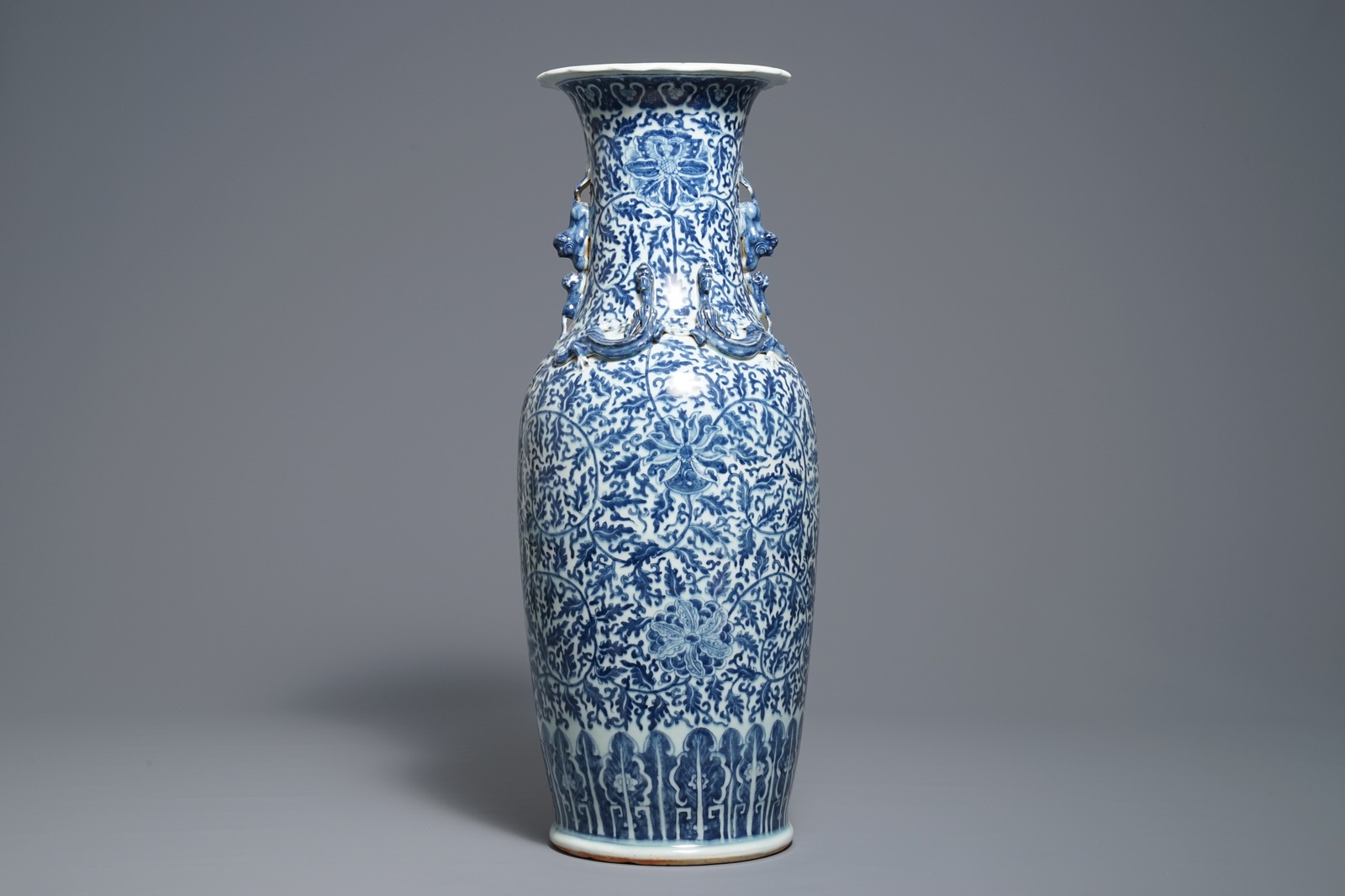 A Chinese blue and white 'lotus scroll' vase, 19th C. - Image 3 of 6