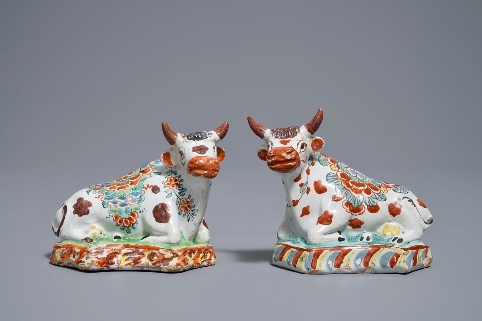 A pair of polychrome Dutch Delft petit feu cows on bases, 18th C. - Image 2 of 7