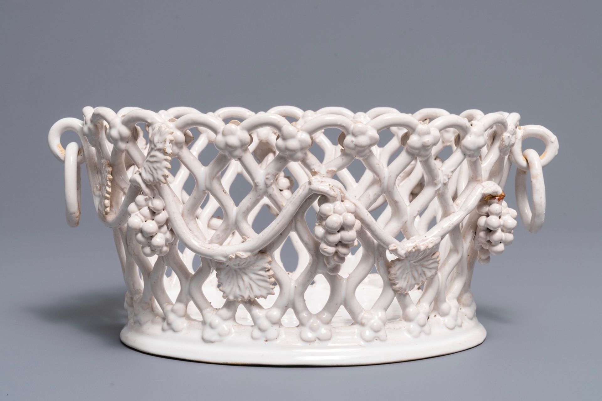 A white-glazed reticulated 'grape vines' basket, France or Italy, 19th C. - Image 4 of 7