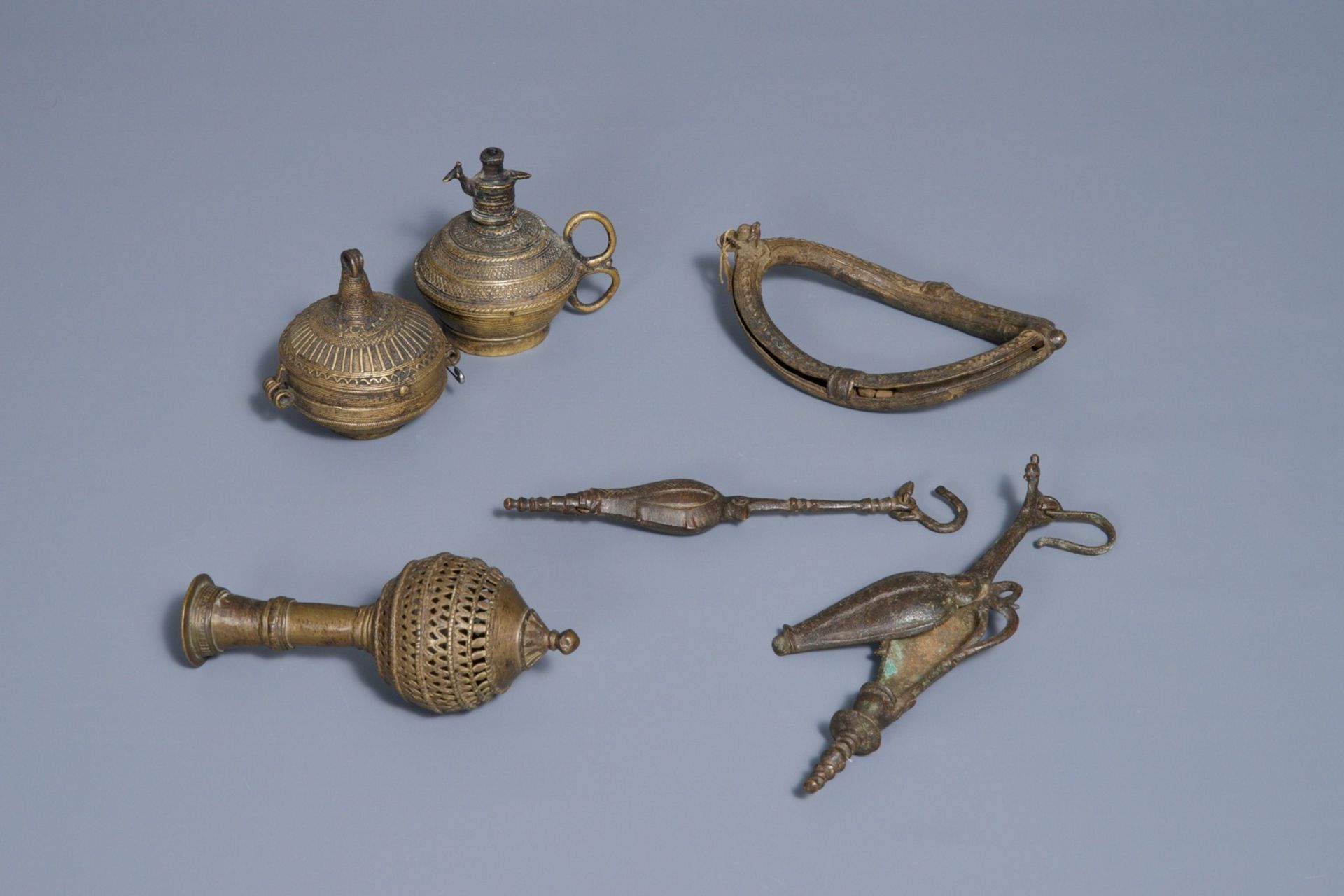A group of silver and bronze statues and utensils, India, 18/19th C. - Image 2 of 4