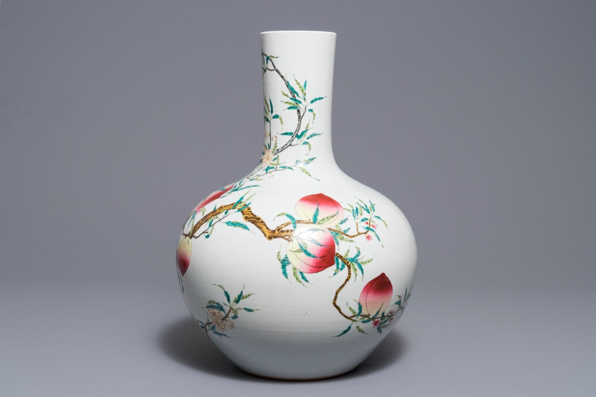 A Chinese famille rose Ônine peachesÕ tianqiu ping vase, Qianlong mark, 20th C. - Image 3 of 5