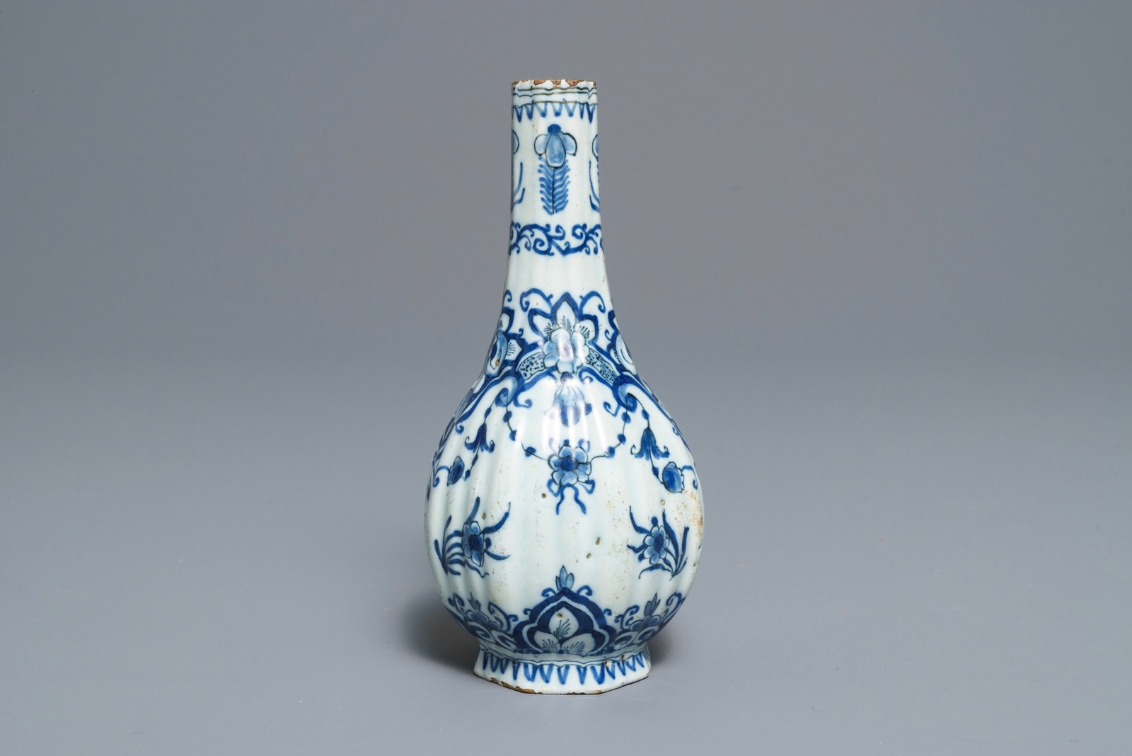 Two Dutch Delft blue and white chargers, an oval dish and a vase, 18th C. - Image 8 of 13