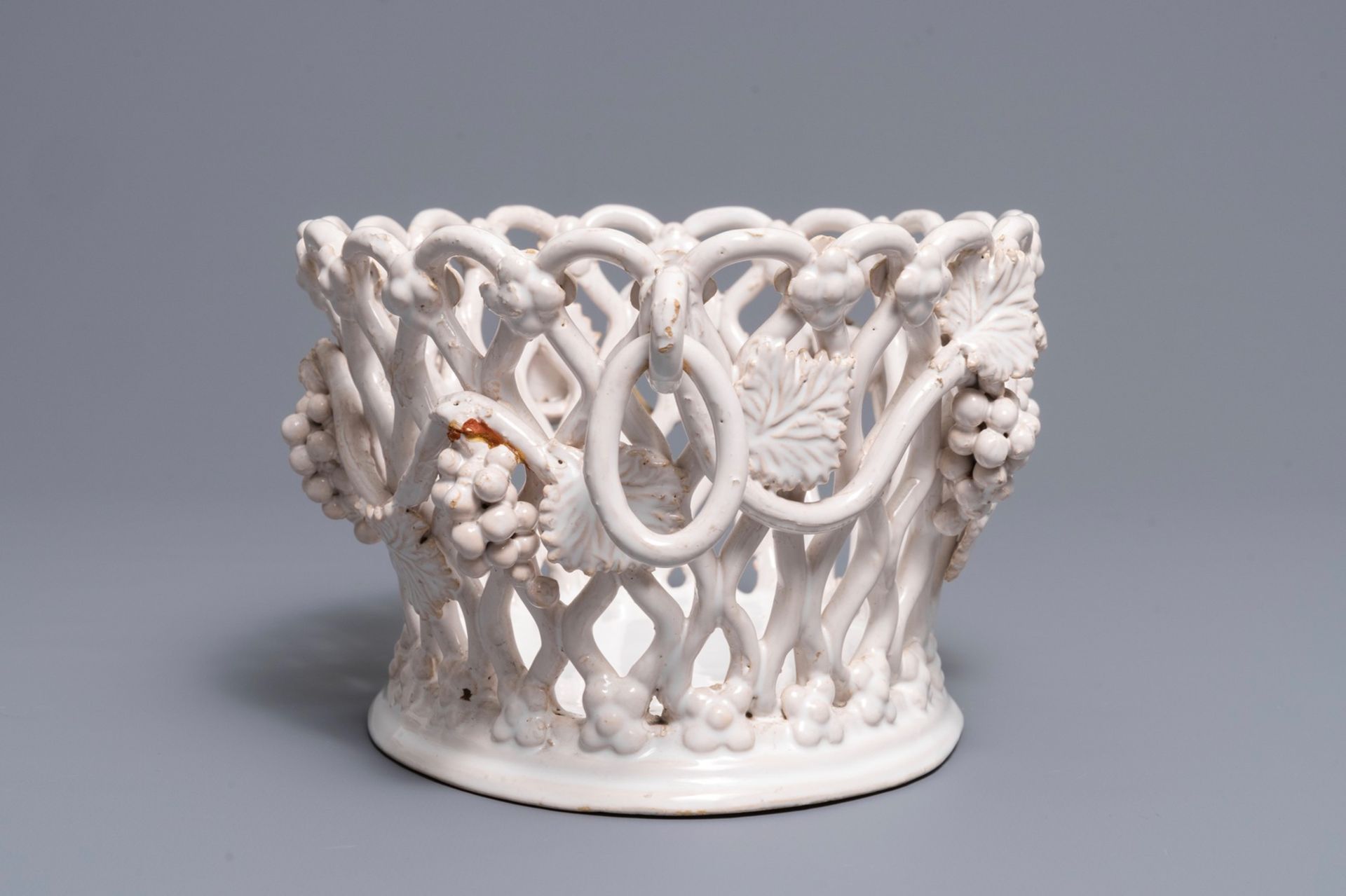 A white-glazed reticulated 'grape vines' basket, France or Italy, 19th C. - Image 3 of 7