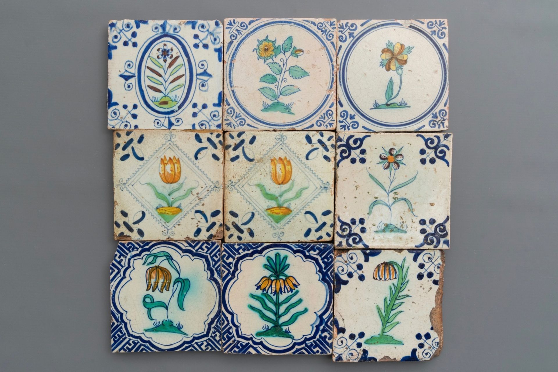 Nine polychrome Dutch Delft flower tiles, 17th C.