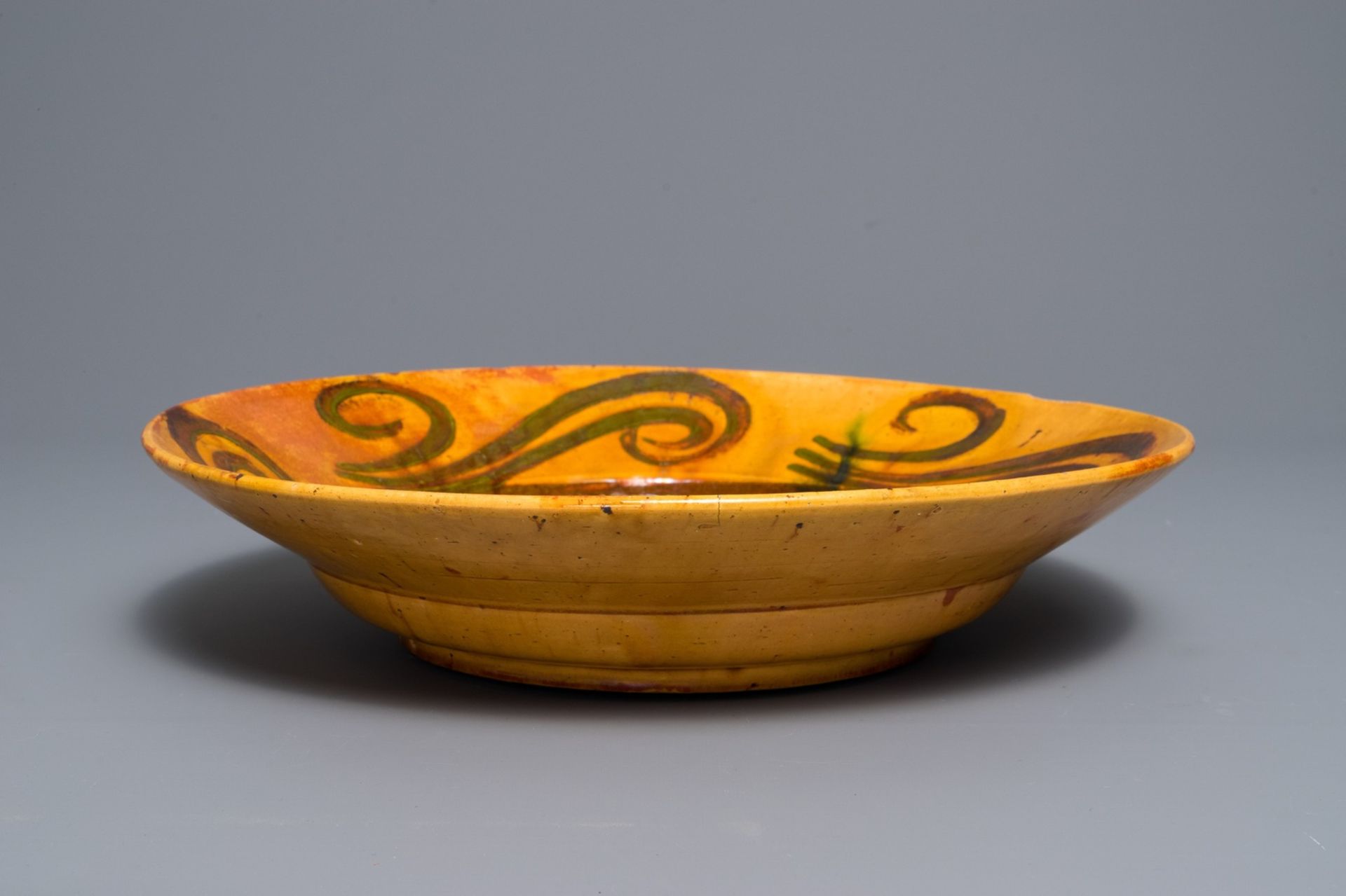 Alfred William Finch (1854 Ð1930): An Art Nouveau yellow- and ochre-glazed pottery dish - Image 3 of 3