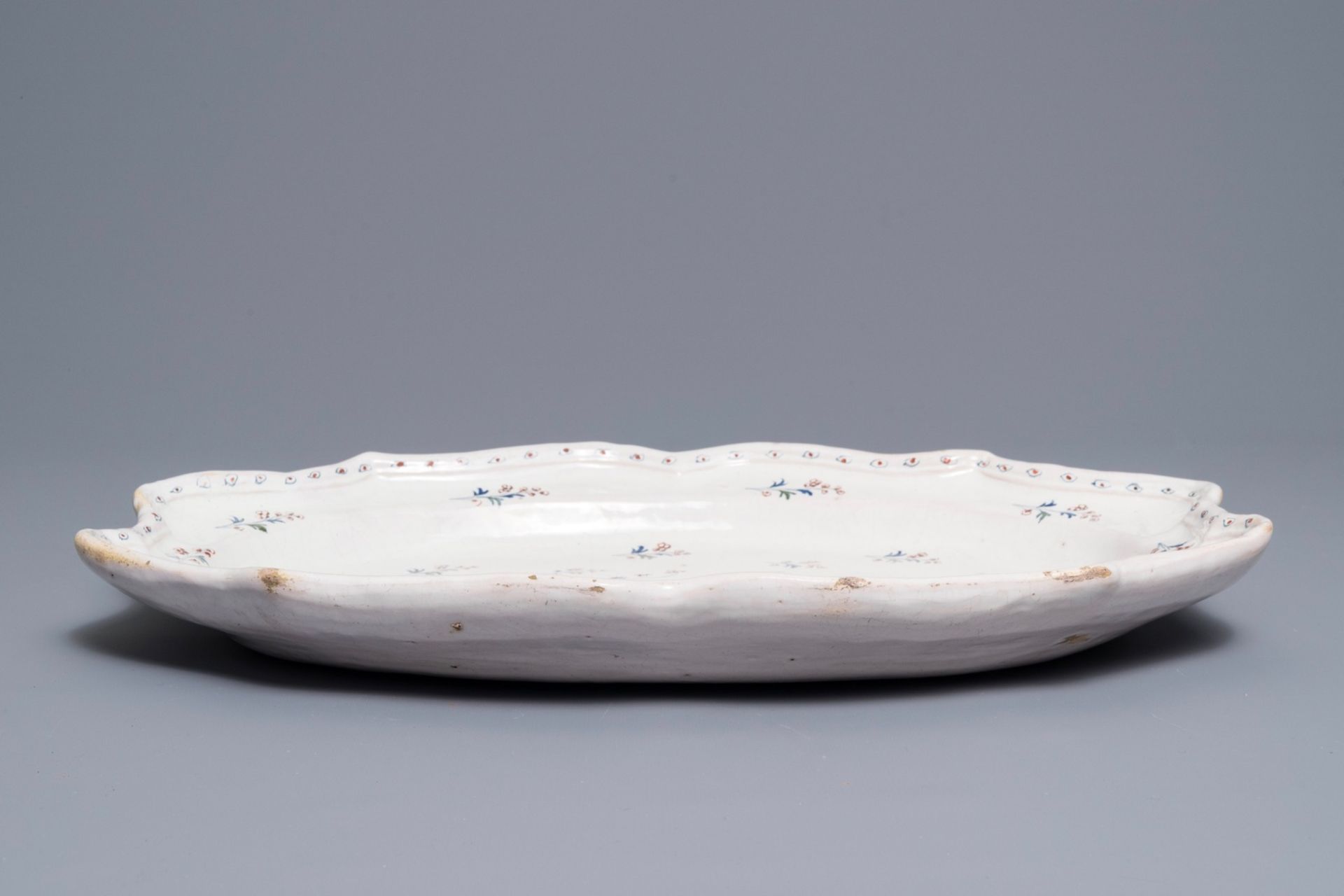 A large oval Brussels faience 'ˆ la haie fleurie' dish, 18th C. - Image 3 of 3