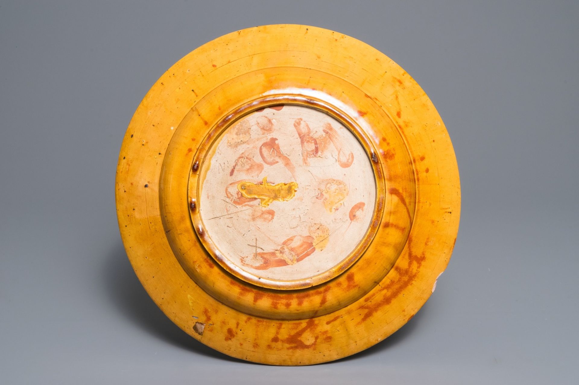 Alfred William Finch (1854 Ð1930): An Art Nouveau yellow- and ochre-glazed pottery dish - Image 2 of 3