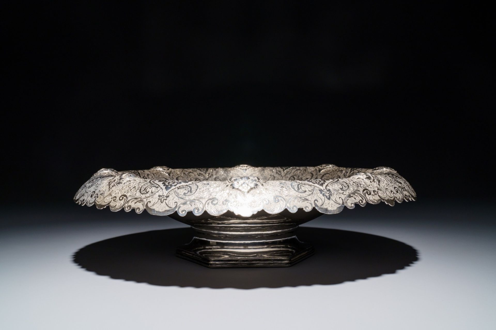 An engraved silver bowl on stand, Iran, 1967-1979