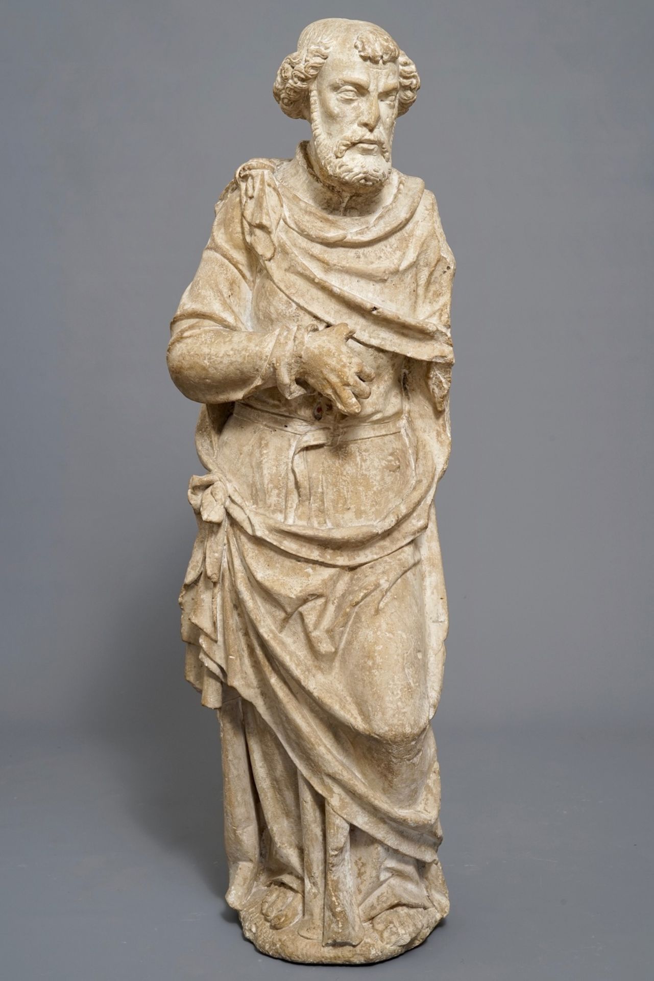 A carved stone figure of Saint Peter standing, prob. France, 16th C. - Image 2 of 7