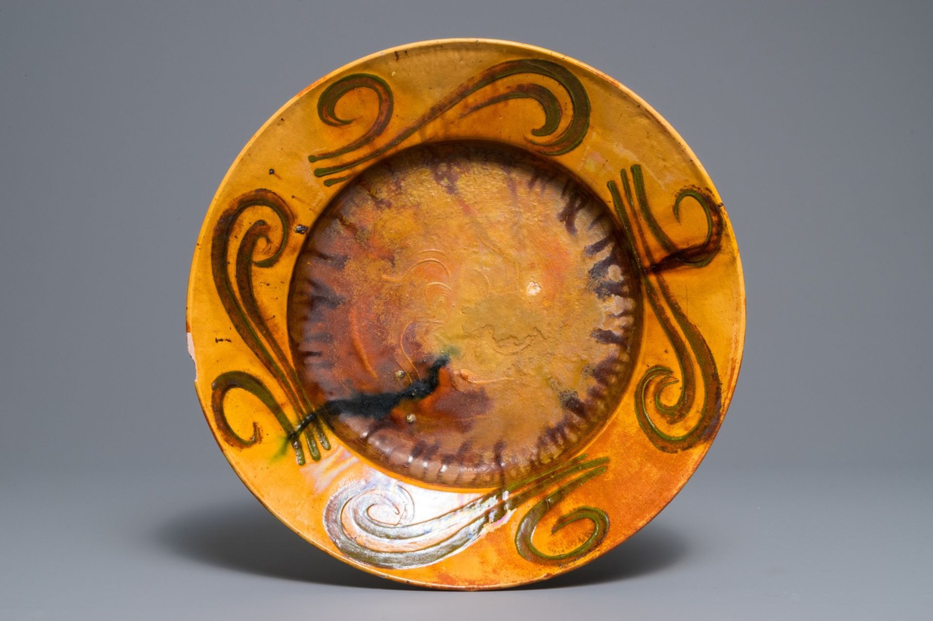 Alfred William Finch (1854 Ð1930): An Art Nouveau yellow- and ochre-glazed pottery dish