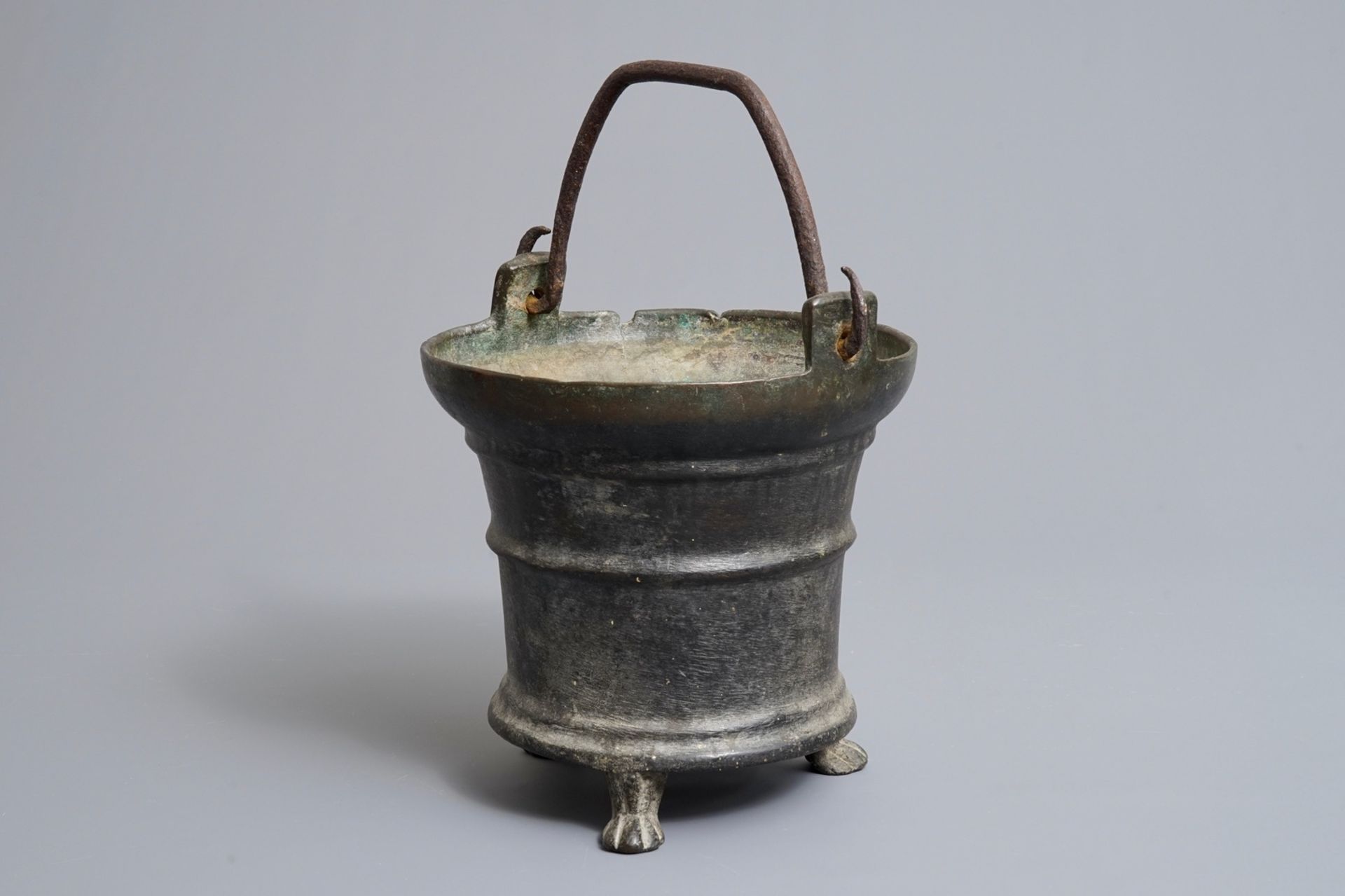 A bronze holy water bucket on lion paw feet, Southern Netherlands, 16th C.