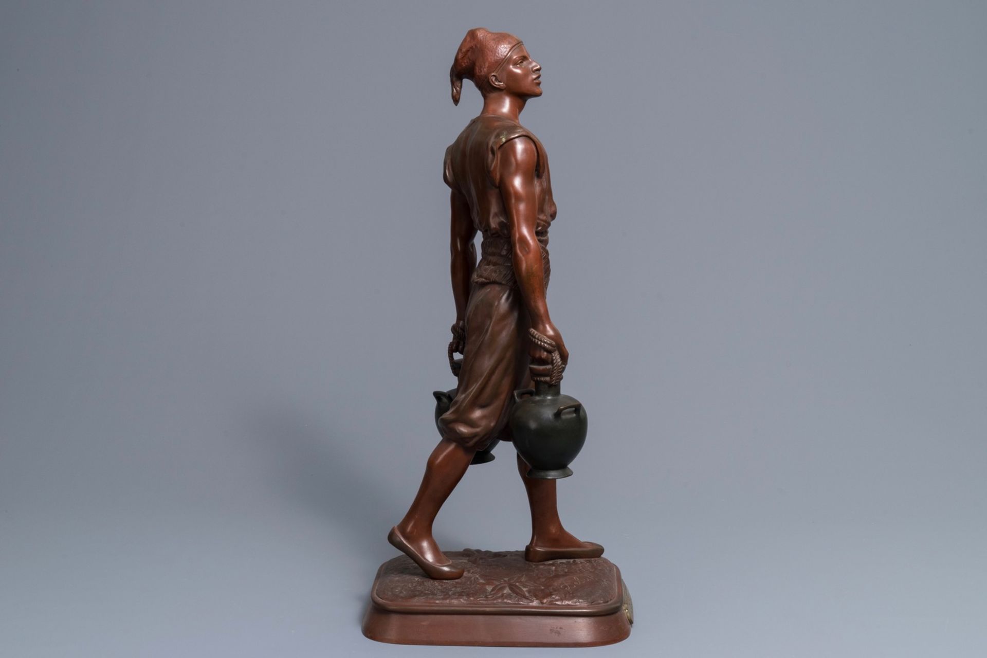 Jean-Didier Debut (1824-1893): Porteur dÕeau arabe, a cold painted bronze figure - Image 3 of 9