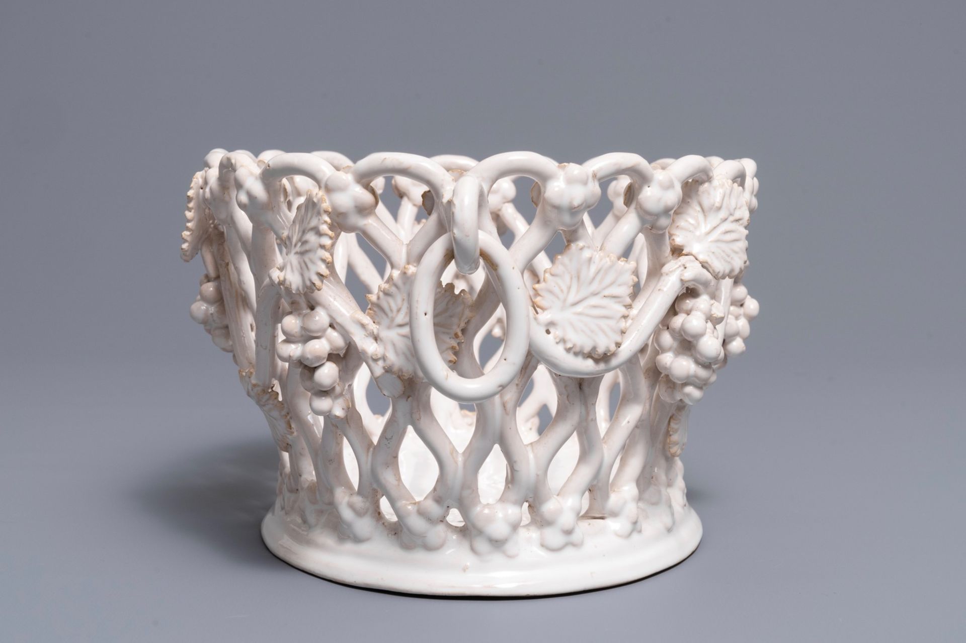 A white-glazed reticulated 'grape vines' basket, France or Italy, 19th C. - Image 5 of 7