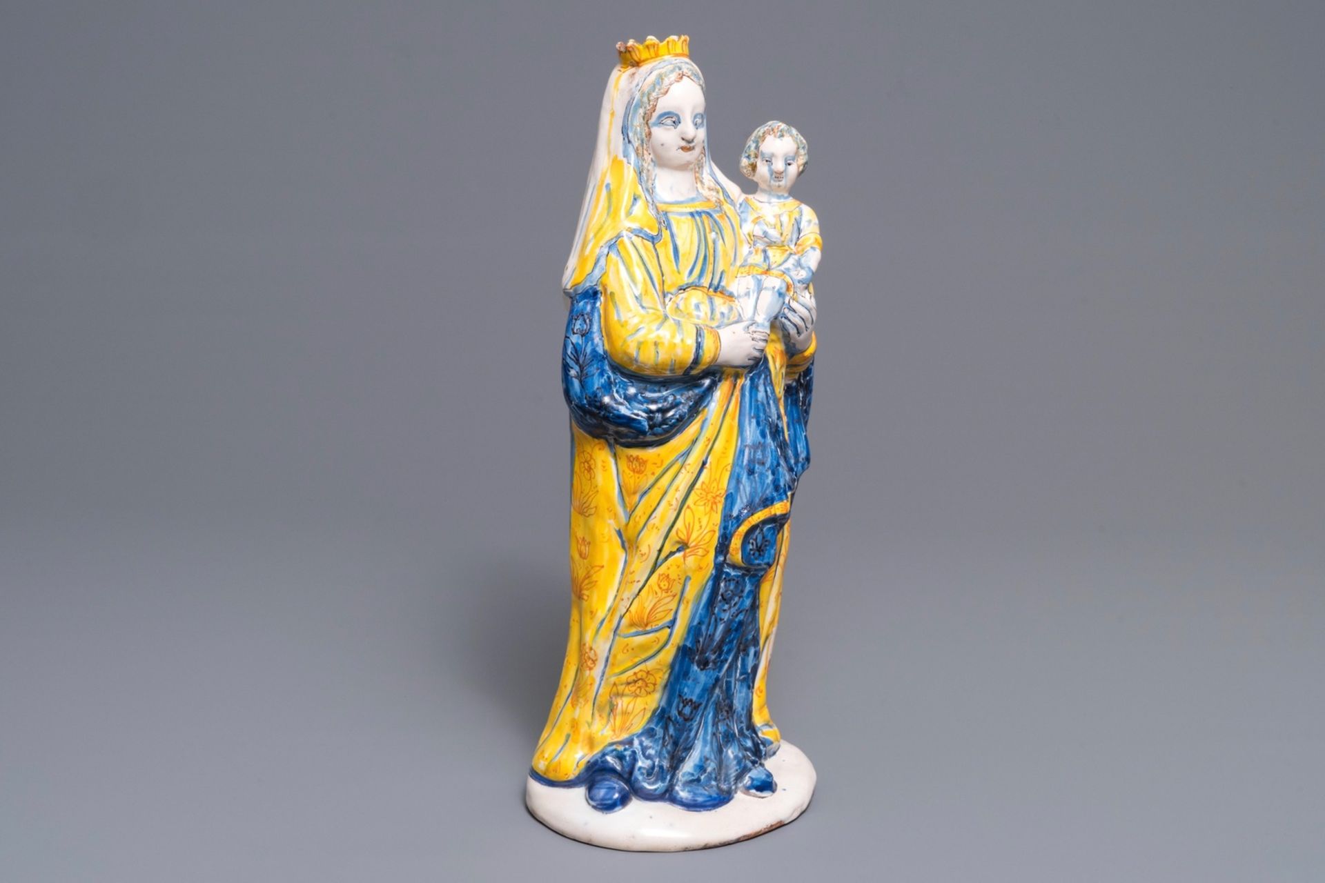 A large French faience figure of the Virgin with Child, Nevers, 17th C.