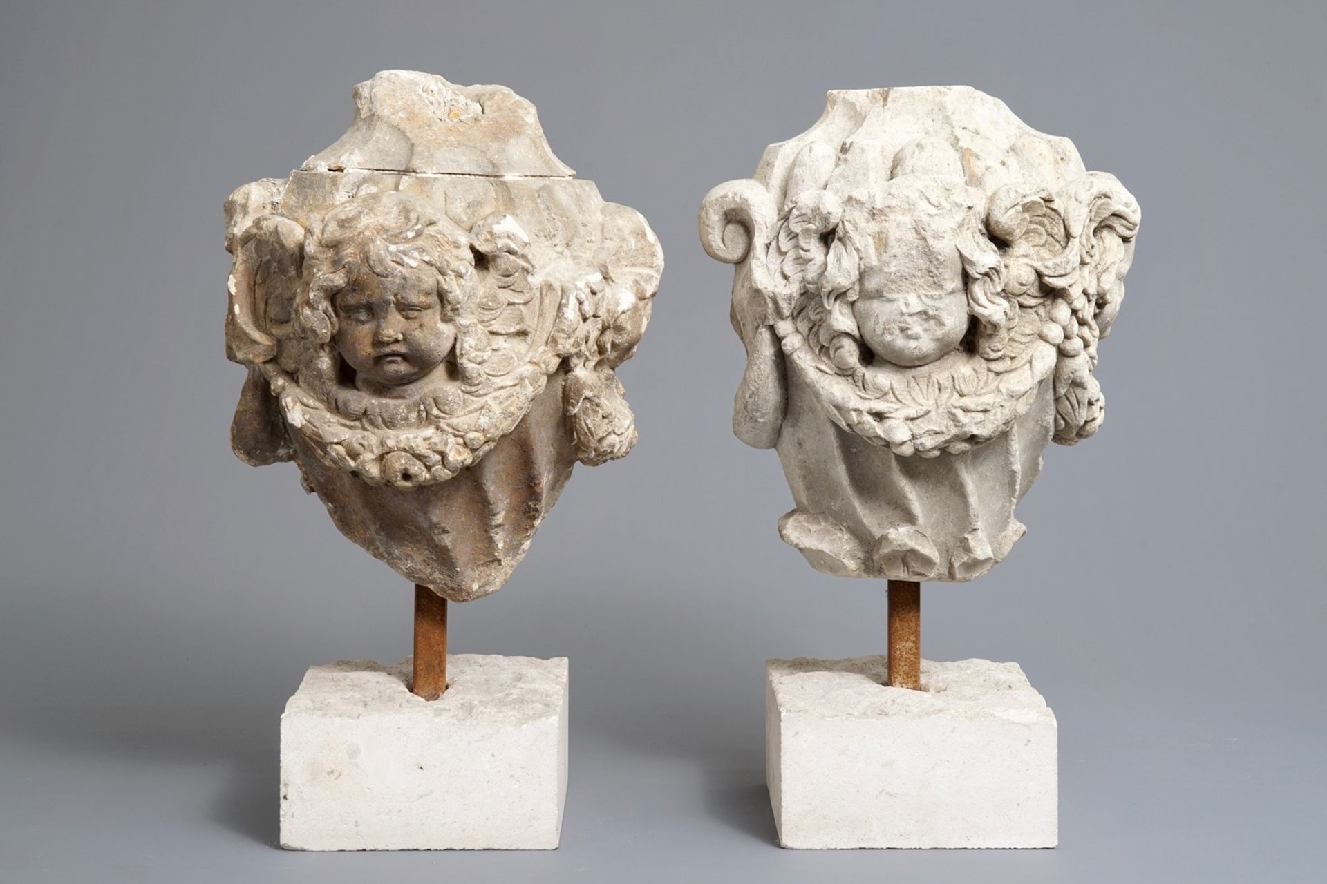 A pair of architectural stone ornaments with cherub's heads and garlands, 18th C. - Image 2 of 5