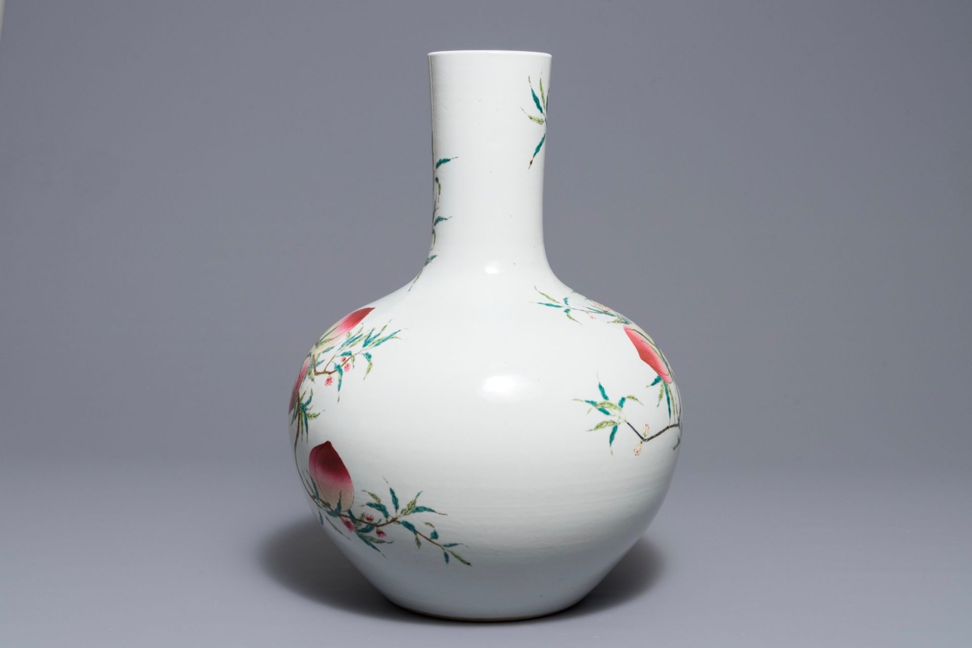 A Chinese famille rose Ônine peachesÕ tianqiu ping vase, Qianlong mark, 20th C. - Image 2 of 5